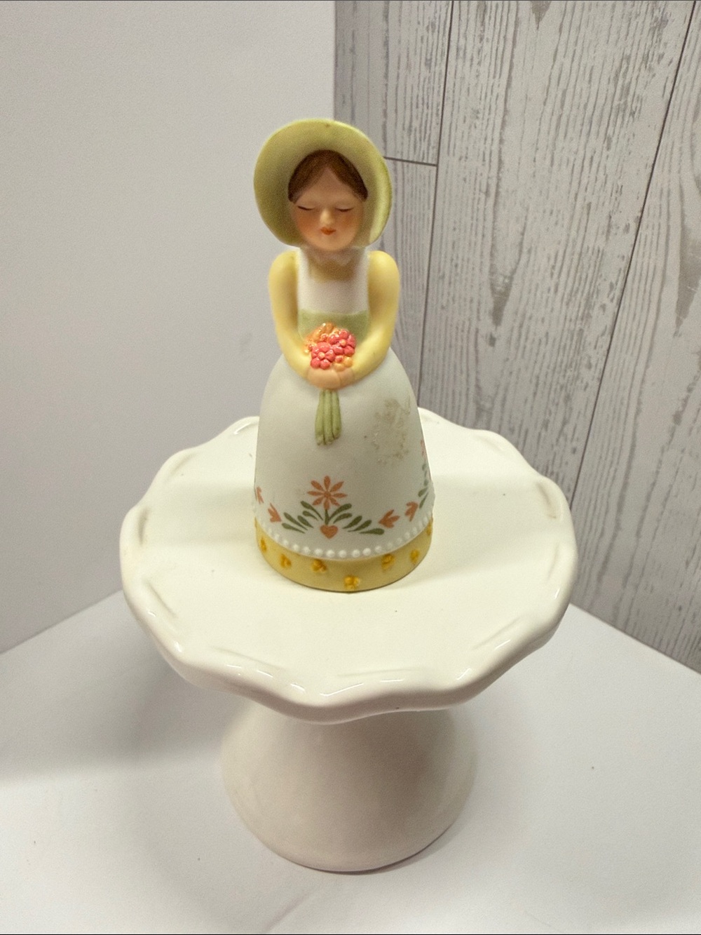 Avon Yellow and White Ceramic Girl Figurine with Pink Bouquet